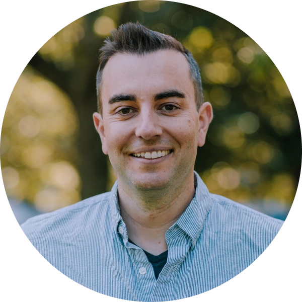 Own Up Co-founder Mike Tassone smiles at the camera