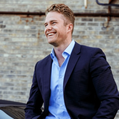 smiling man with dress shirt and suit jacket